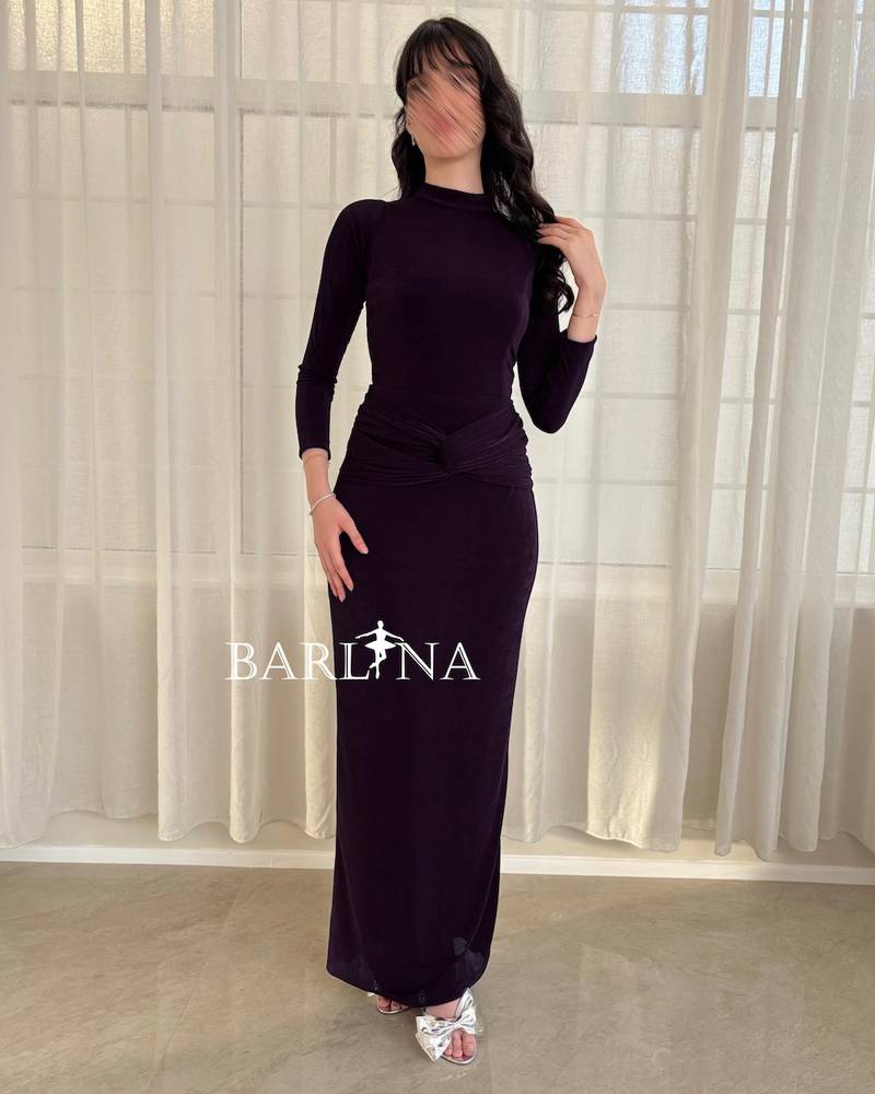 Dark purple dress with a wrap at the waist