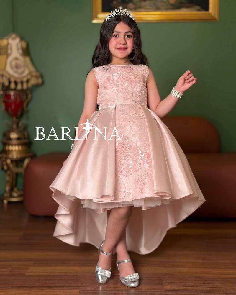 Pink girls' evening dress with a high-low cut