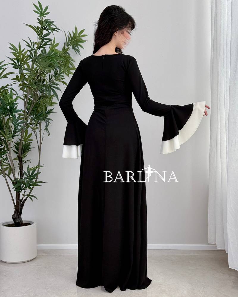 A soft, black and white dress with a flared cut