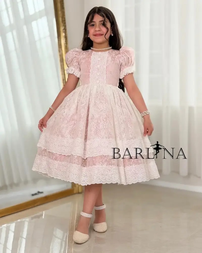 Light pink girls' dress with elegant lace