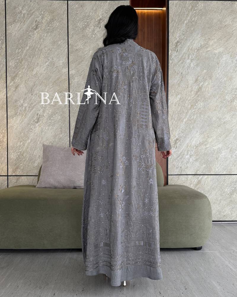 Grey abaya decorated with finely distributed embroidery