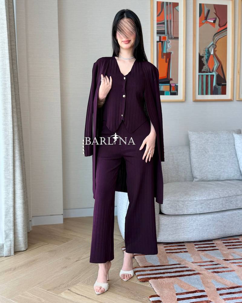 Burgundy formal suit with wide-leg trousers and a long jacket