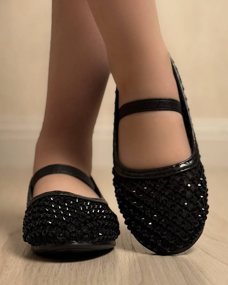 Soft girls' shoes adorned with sparkling crystals