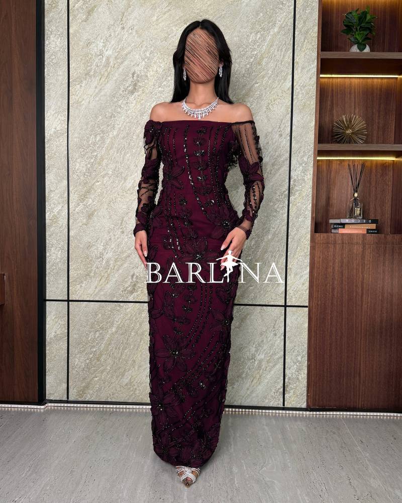 Burgundy dress with full embroidery and rose designs