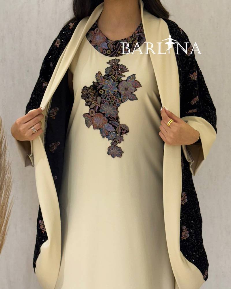 Beige jalabiya with a black floral jacket