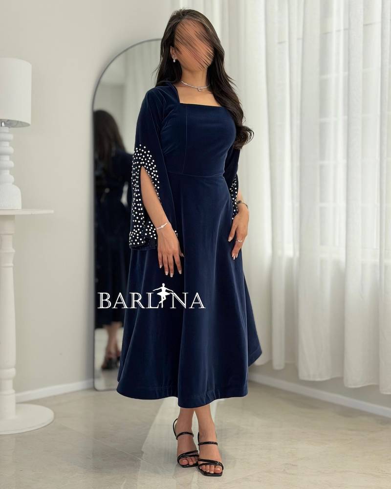 Navy blue velvet dress embroidered with pearls