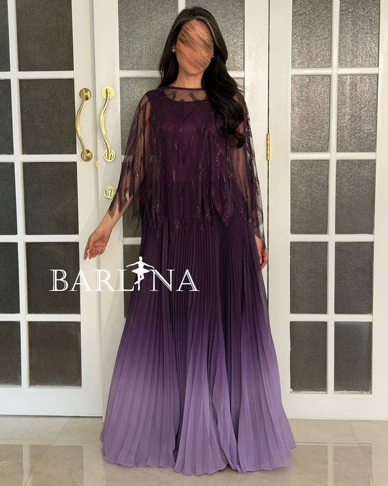 Long dress in a purple gradient with a pleated design