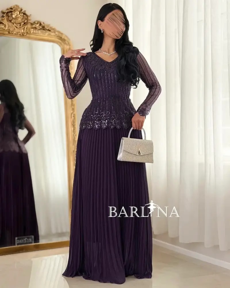 Luxurious dress with elegant sheer sleeves