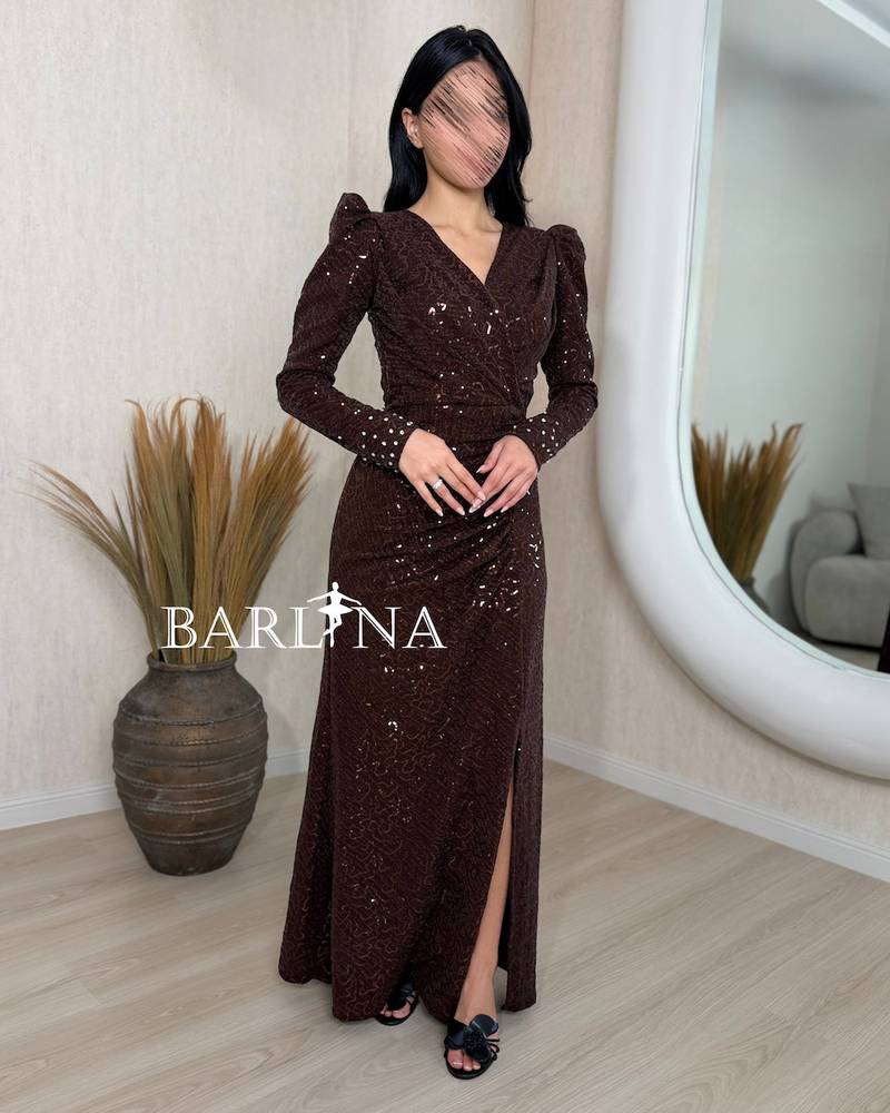 Brown dress with light embroidery and a side slit