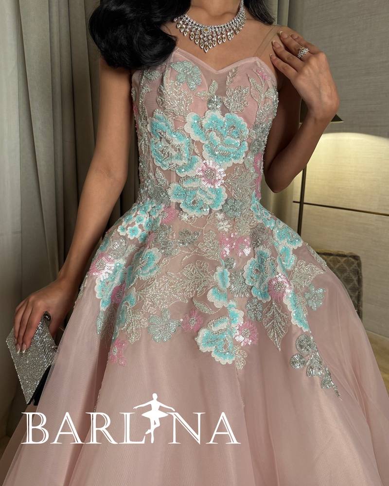 Pink dress with colorful embroidered flowers