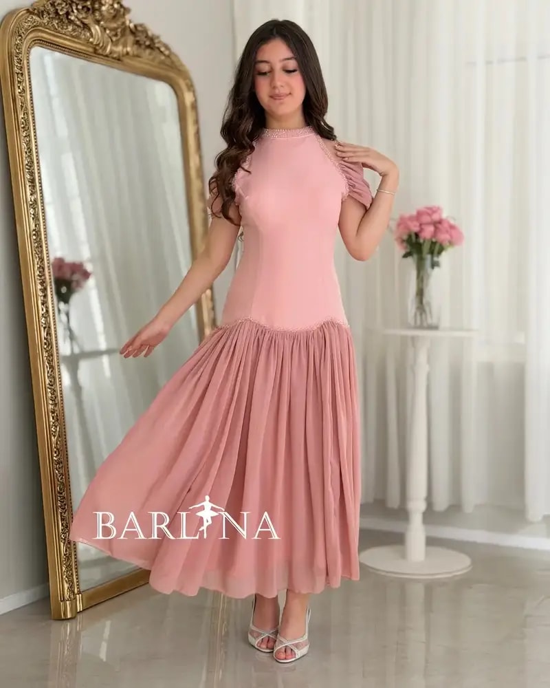 Pink halter dress with off-shoulder sleeves