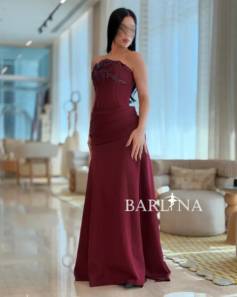 Burgundy dress with a corset design and wide cut