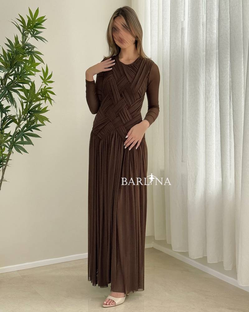 Long brown dress with an overlapping wrap design