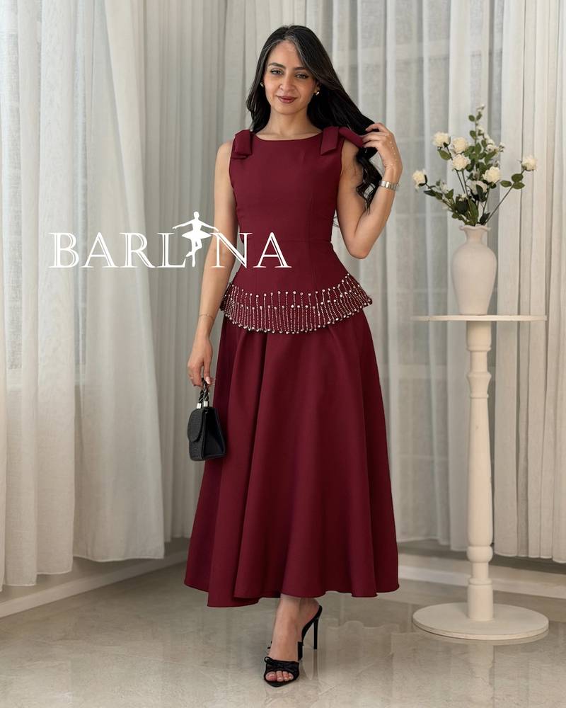 Two-piece burgundy set decorated with rhinestones