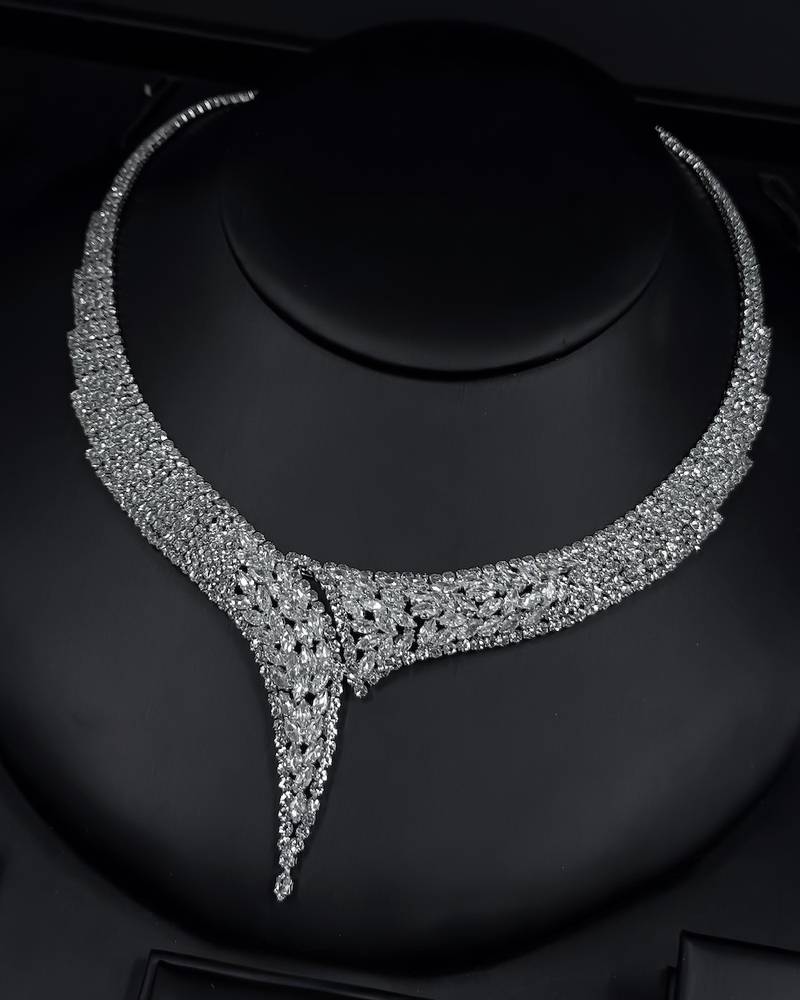 A luxurious silver accessory set with a streamlined design