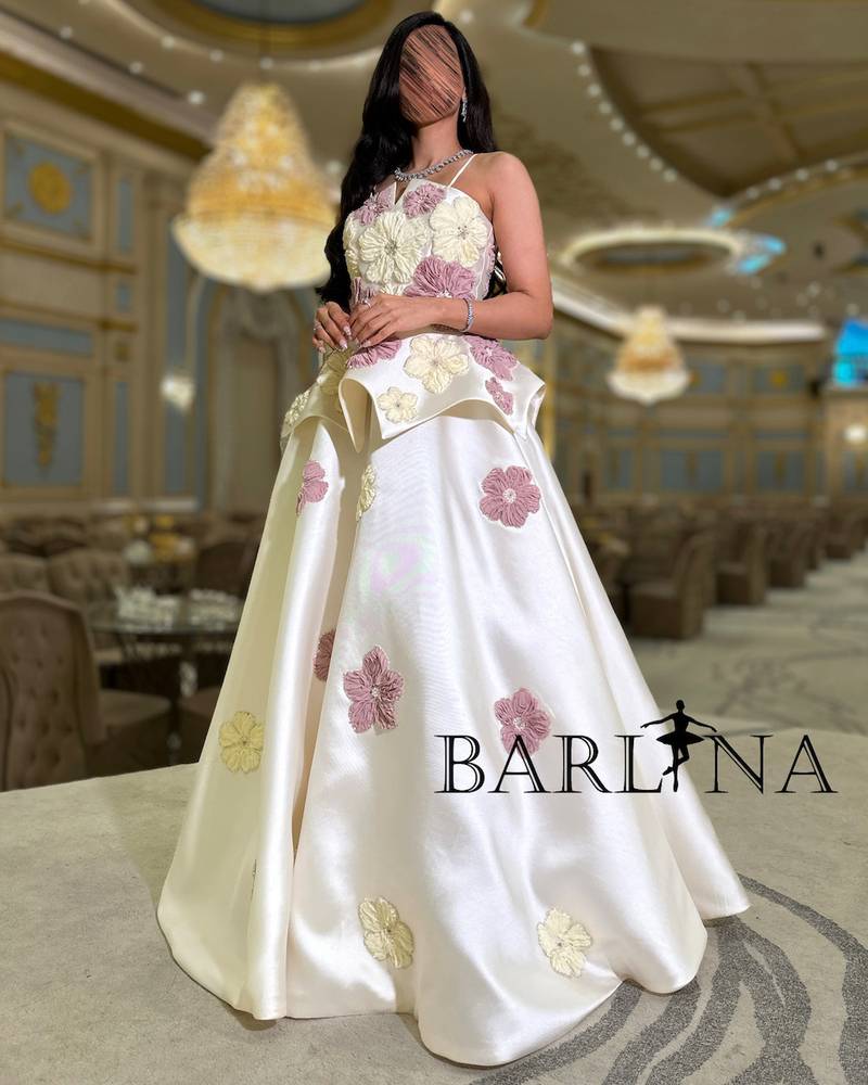 Ivory white dress with prominent embroidery
