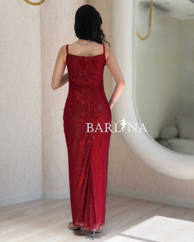Long shimmering red dress with a gathered waist