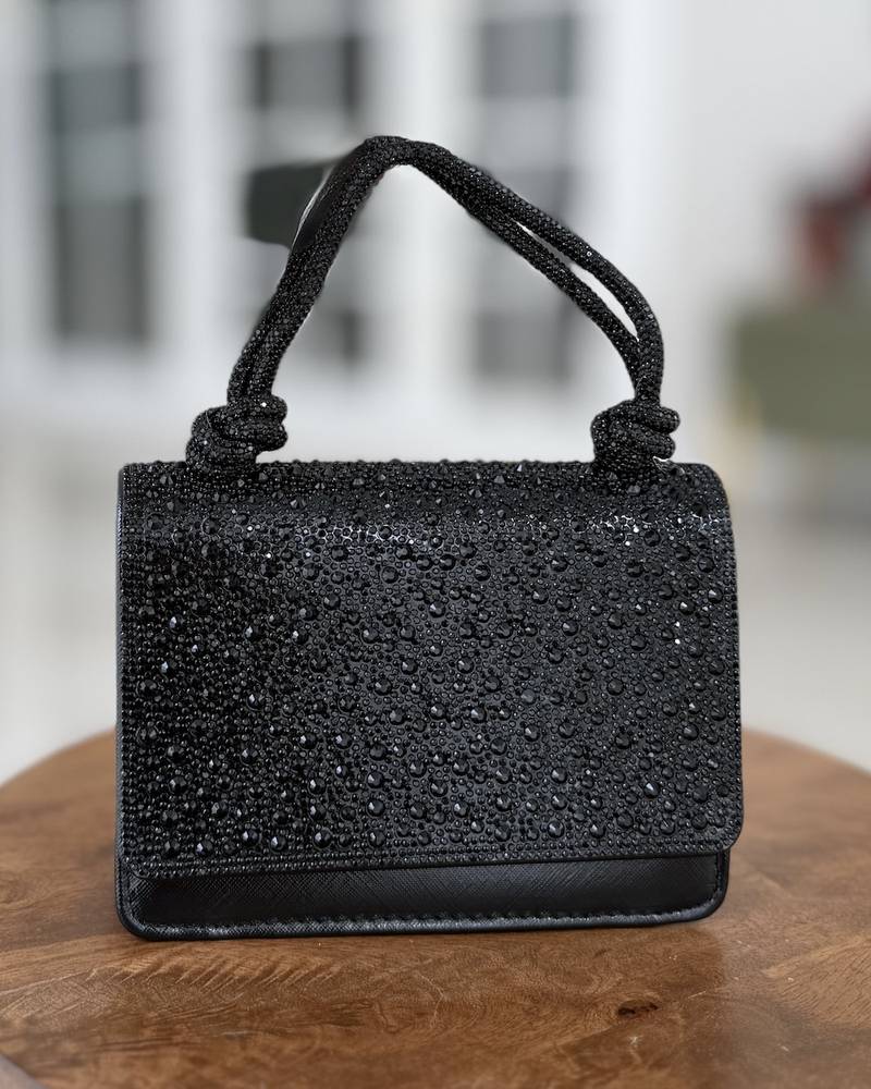 Evening handbag with a knotted top handle