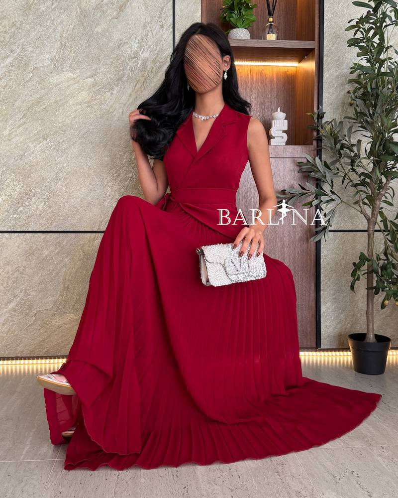 Classic red dress with elegant pleats