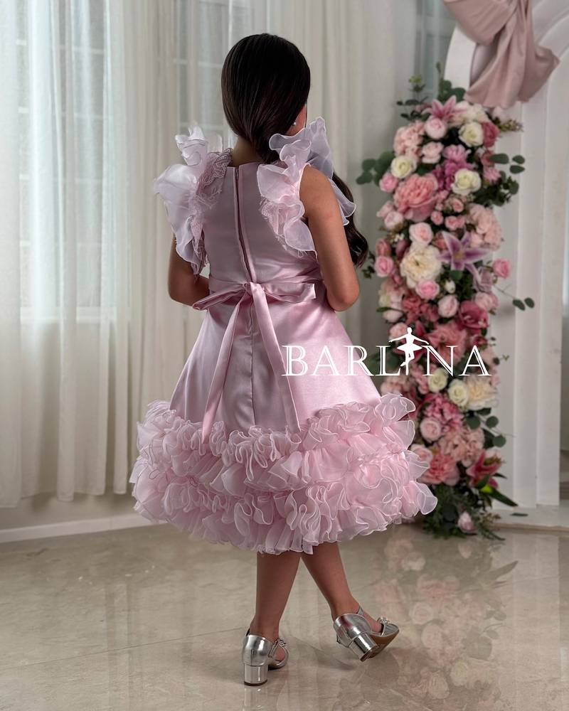 Girls' pink evening dress with a ruffled design
