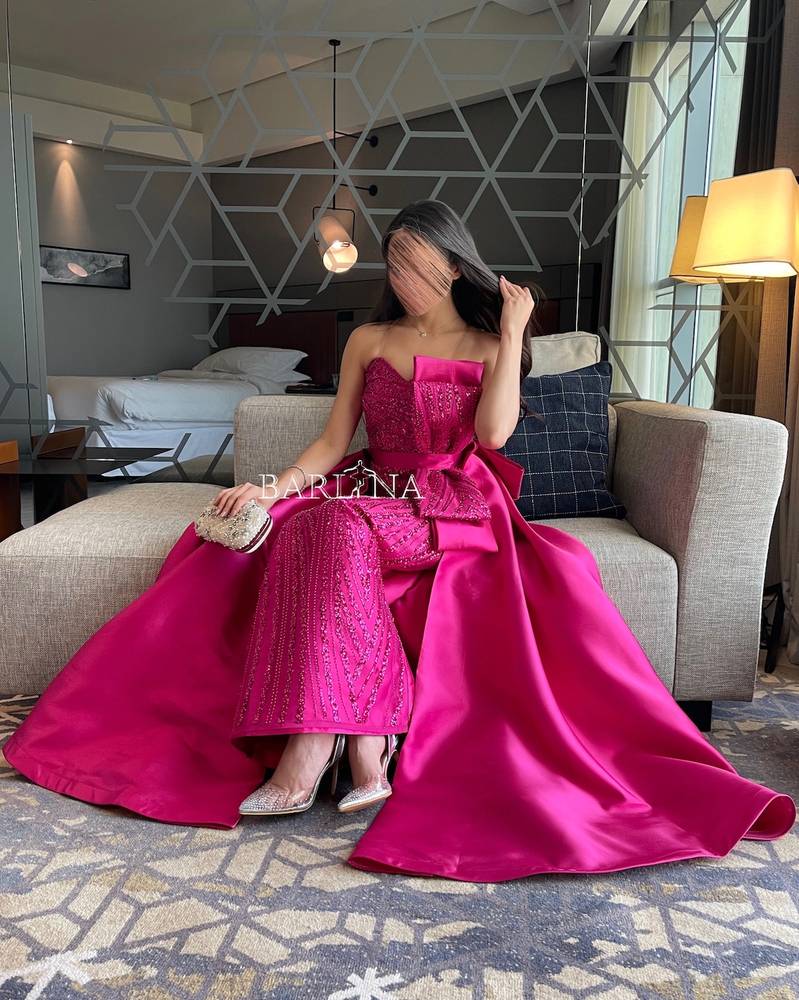 Fuchsia sequin dress with a bow