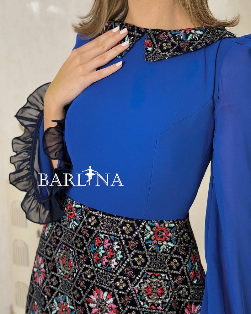 Blue jalabiya with a soft cut and traditional embroidery