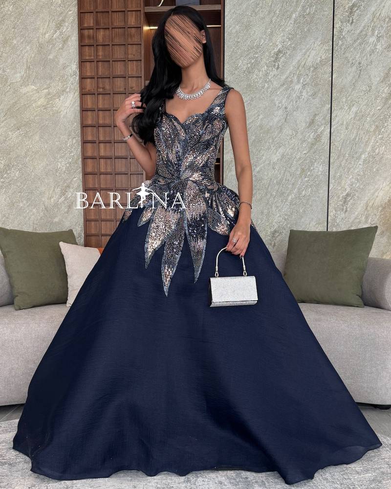 Navy blue evening dress with floral embroidery