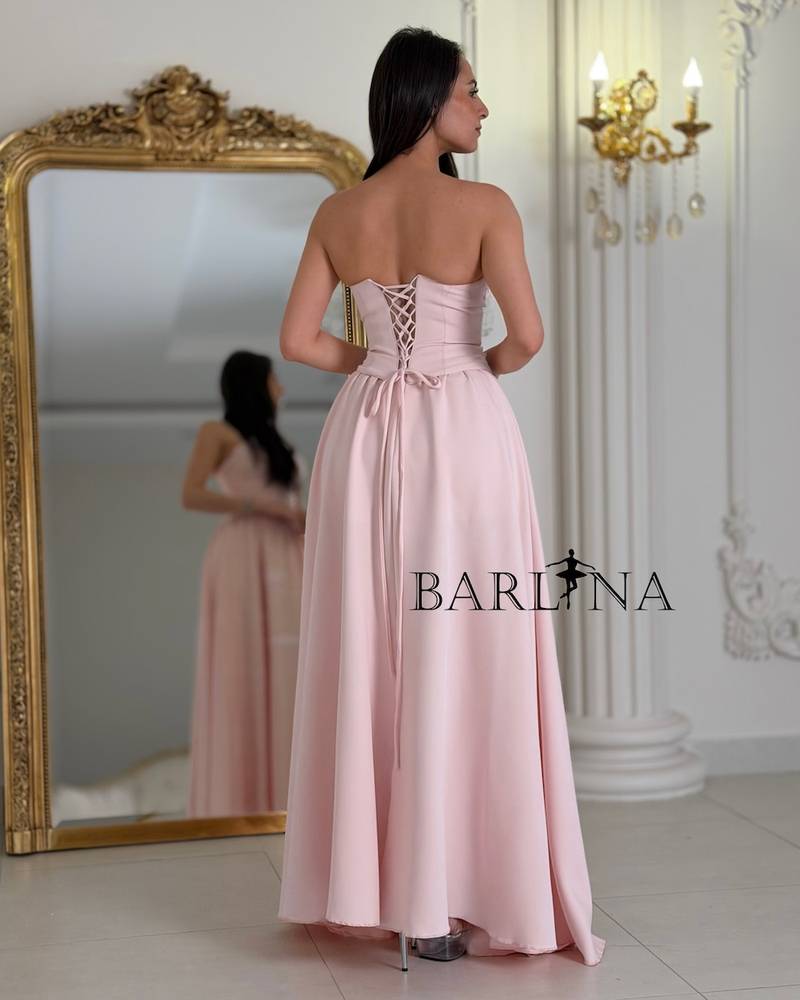 Pink sleeveless evening dress decorated with roses