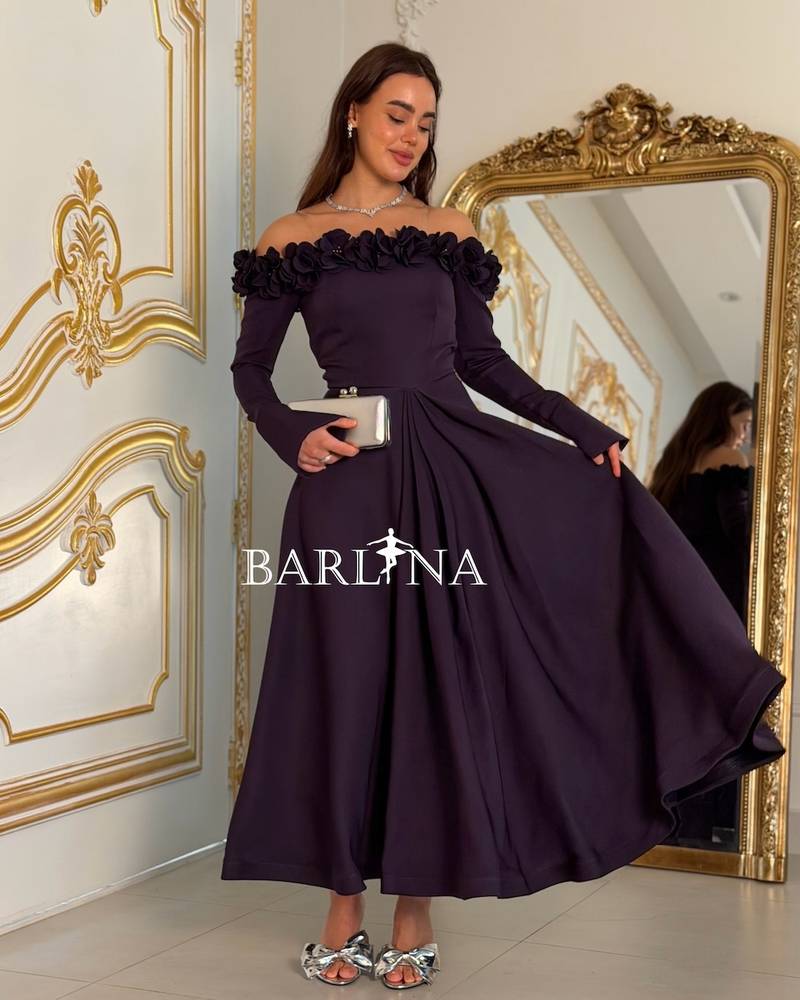 Lilac occasion dress with rose embellishments on the shoulder