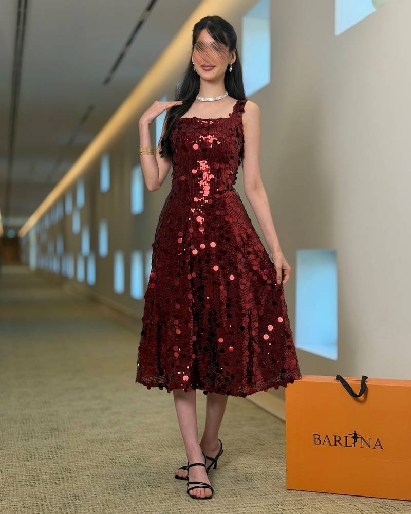Burgundy sequined midi dress with a feminine cut
