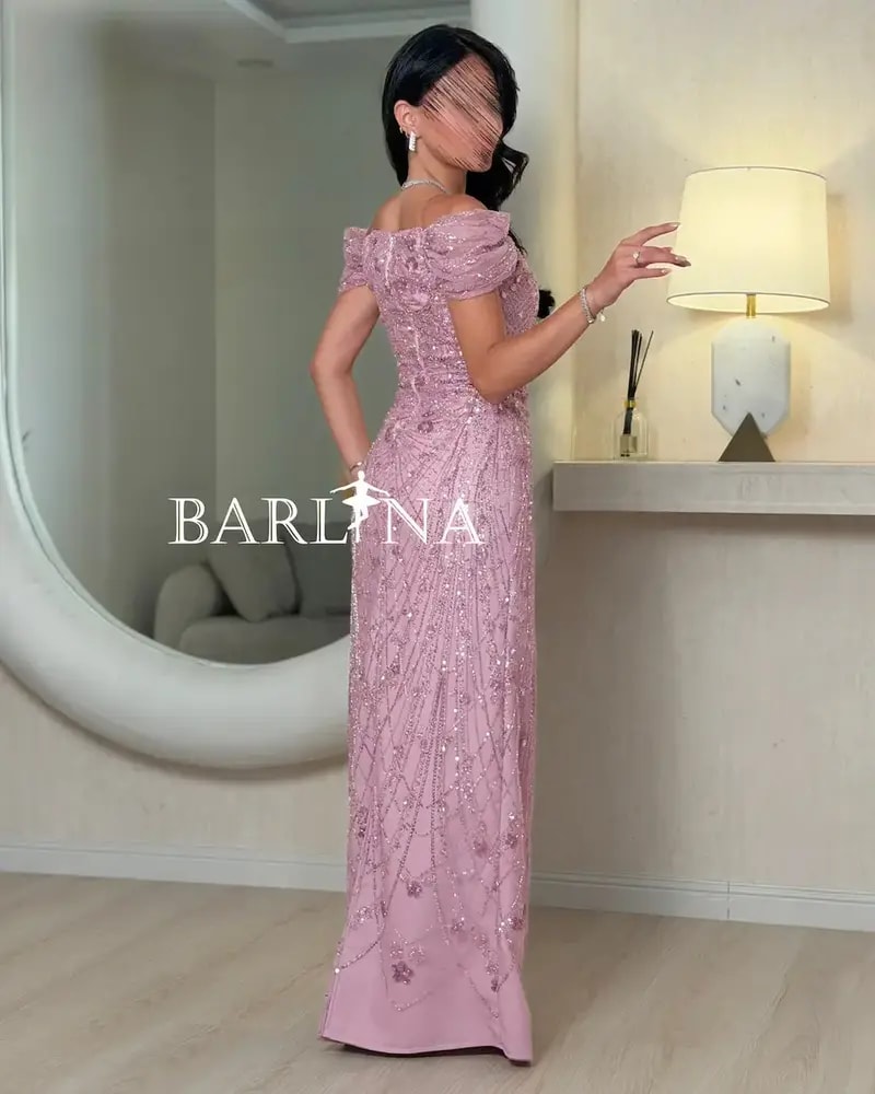 Pink evening dress adorned with shimmering embroidery