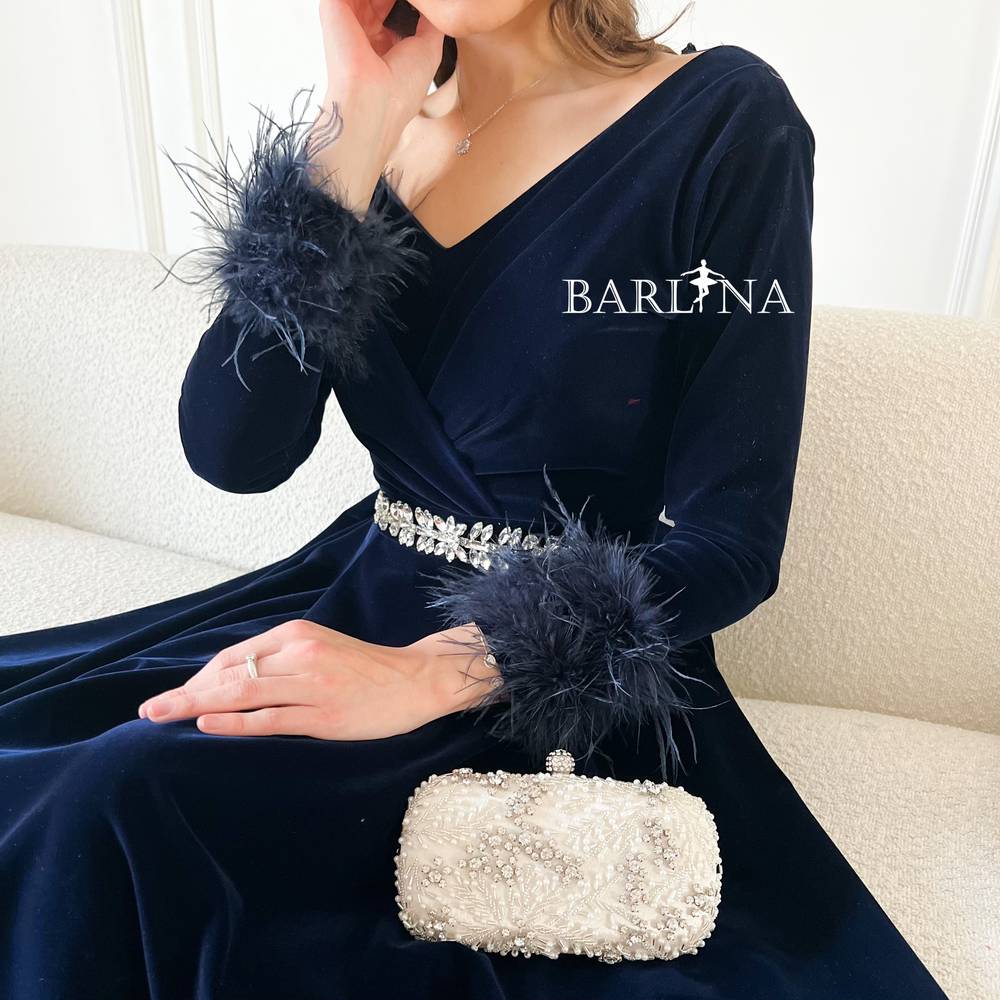 navy blue velvet dress with feathers