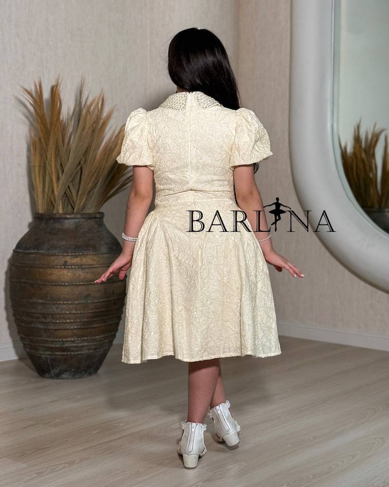 Beige girls' dress with a glittery embellished fabric