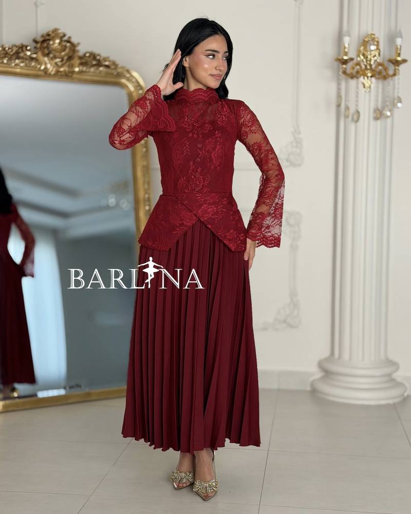 Red lace and pleated dress with long sleeves