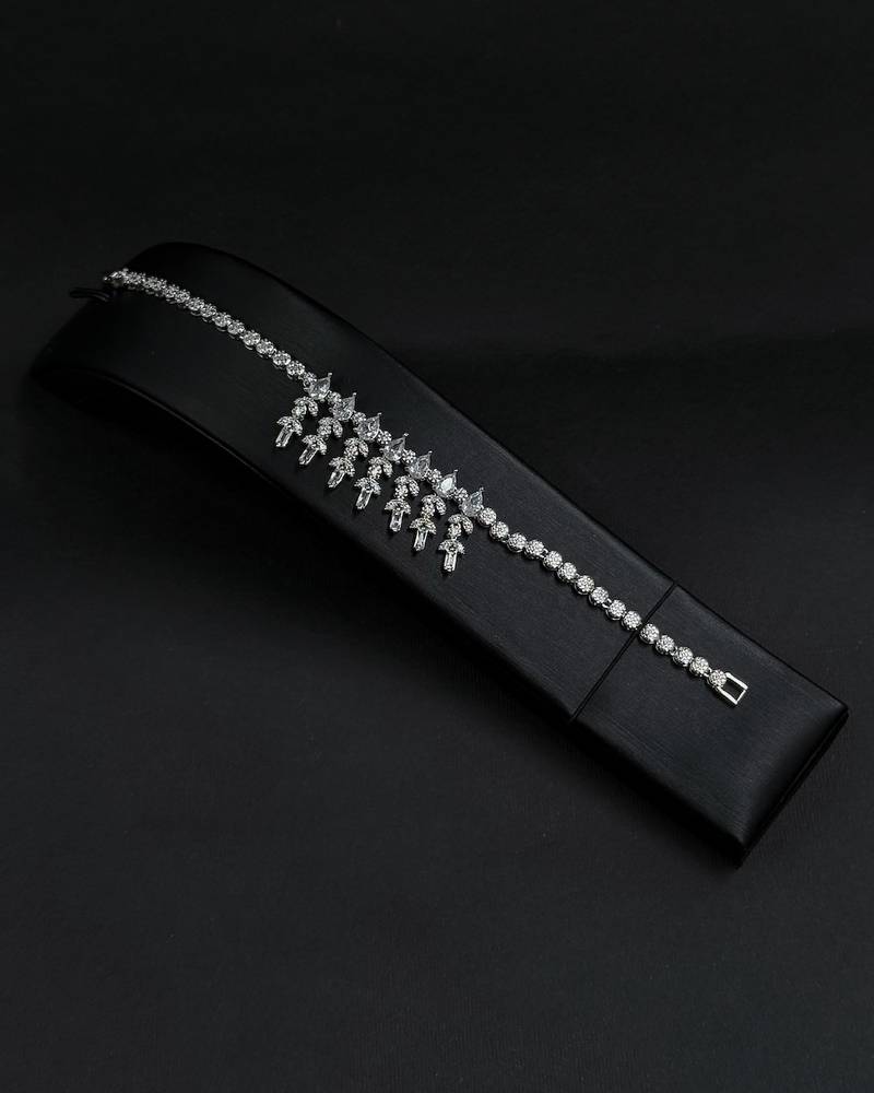 Elegant accessory set with dangling, studded details