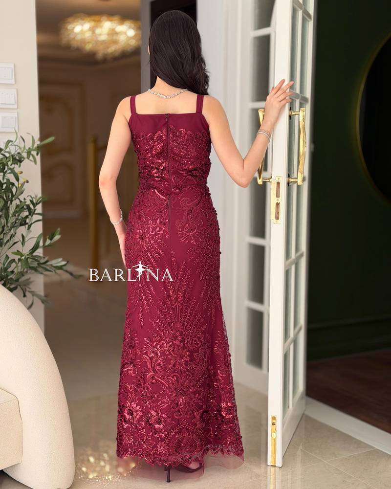 Burgundy dress, fully embroidered with shimmering details