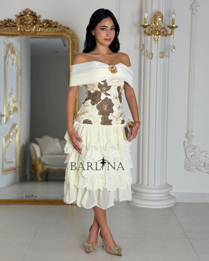 Off white midi dress with an off the shoulder design