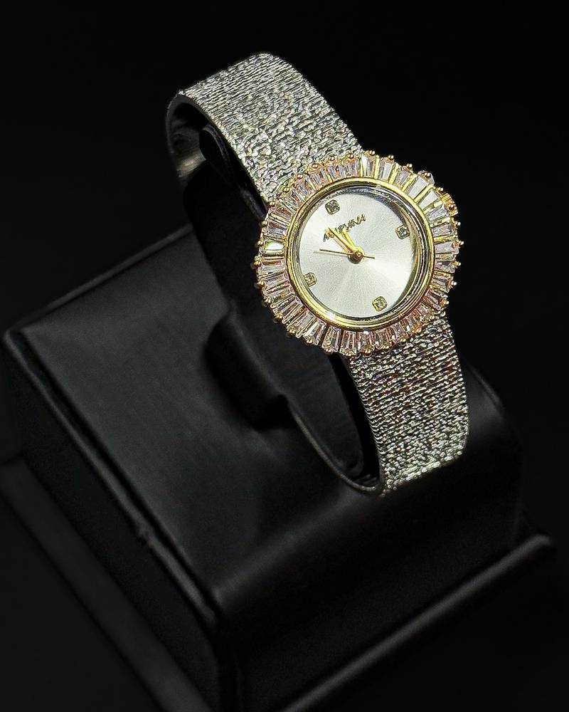 Women's watch with an elegant round case and wide strap