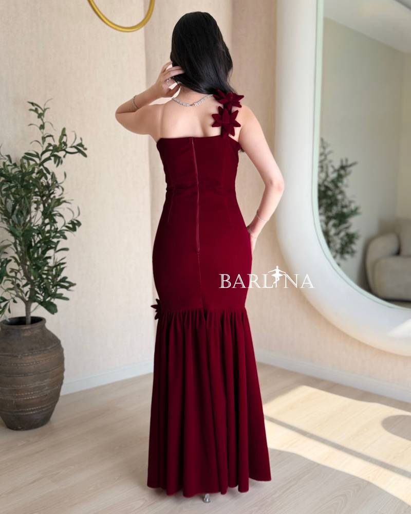 Elegant burgundy dress adorned with roses on the shoulder