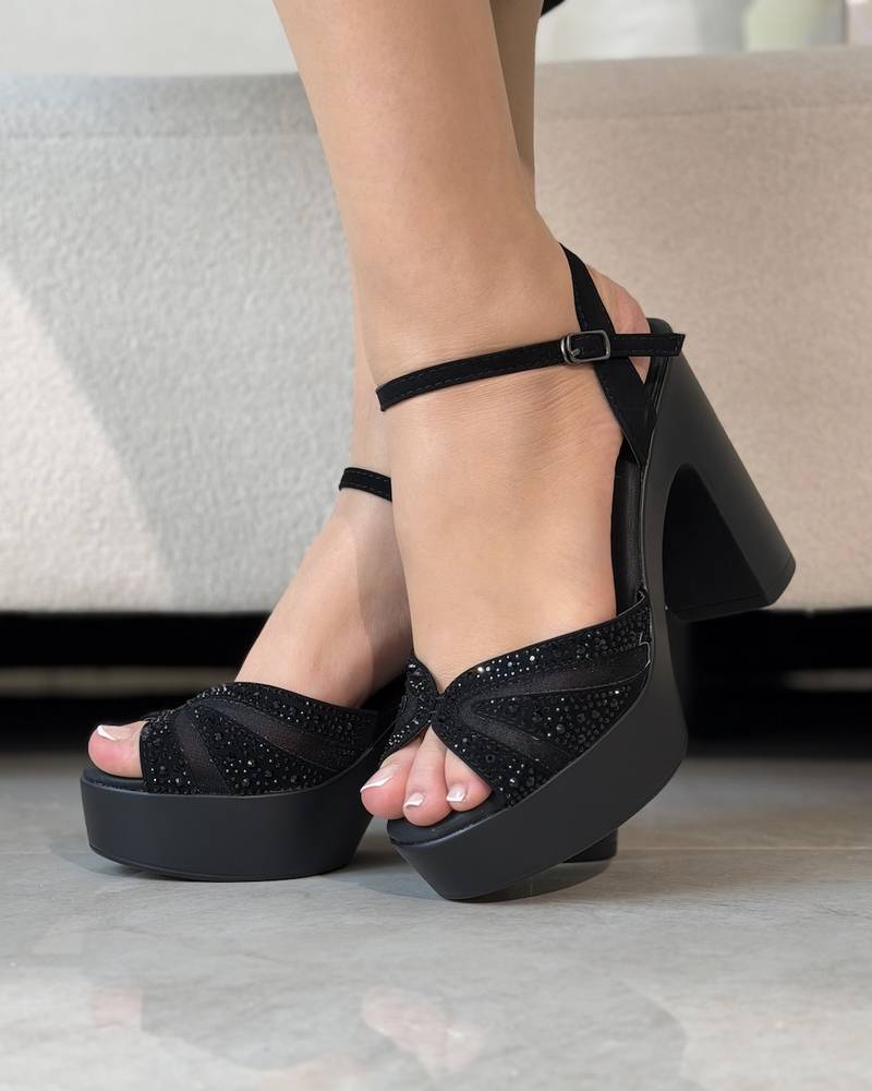 Wide evening heel with a high front platform