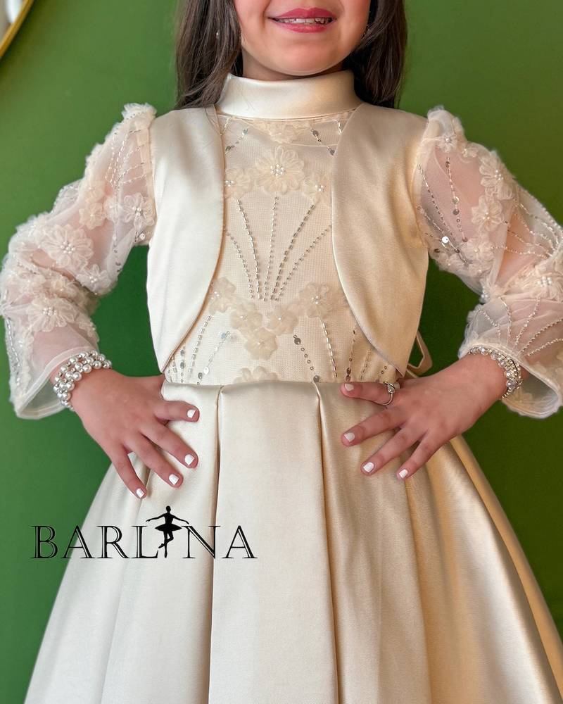 Beige girls' dress with sheer embroidered sleeves