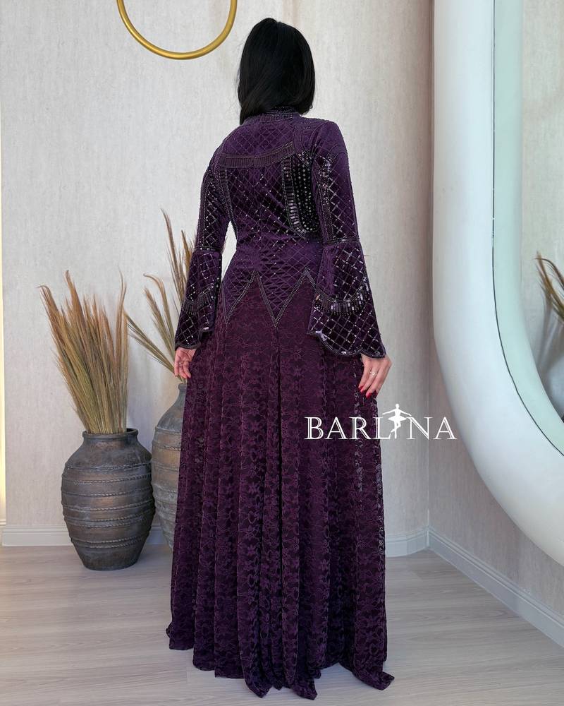 Luxurious purple dress with a high neckline