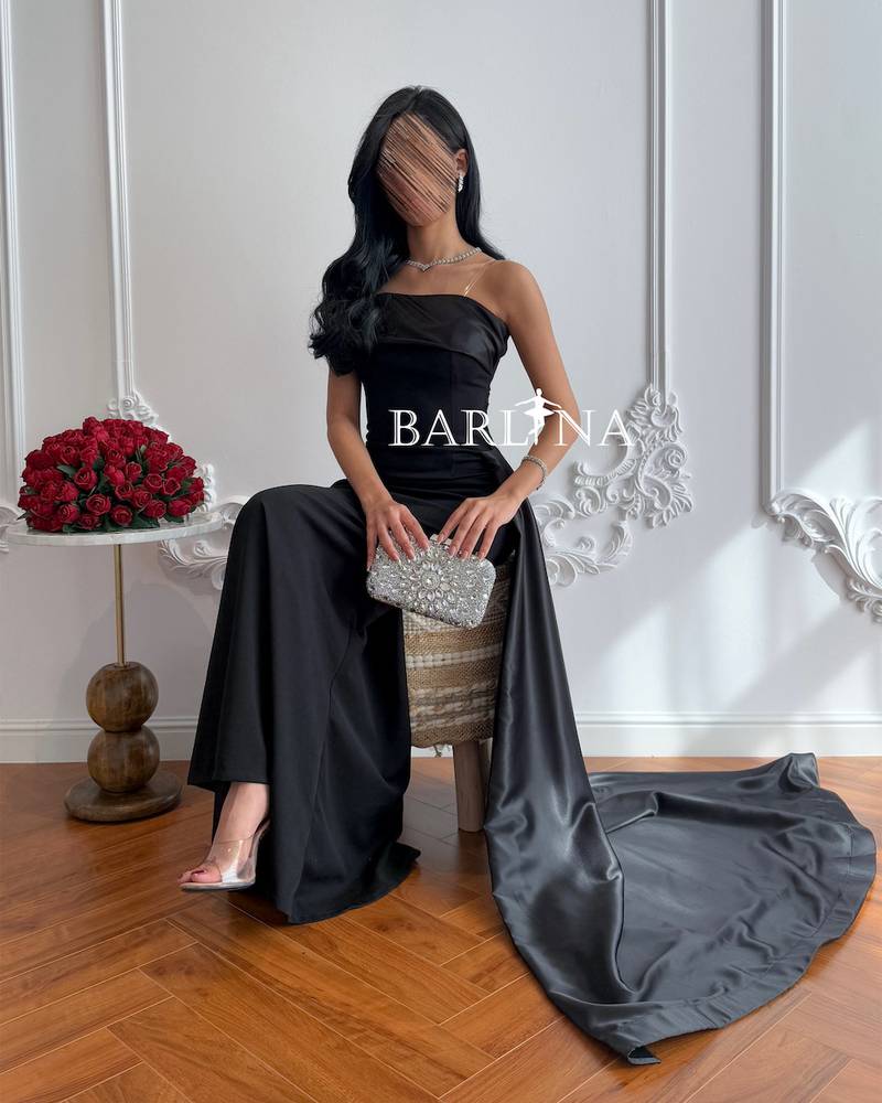 Black bodycon dress with long tail