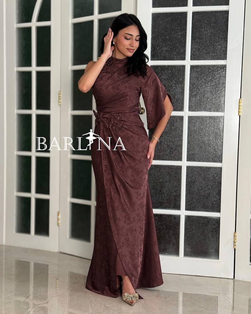 A long dress with a delicate pattern and elegant design