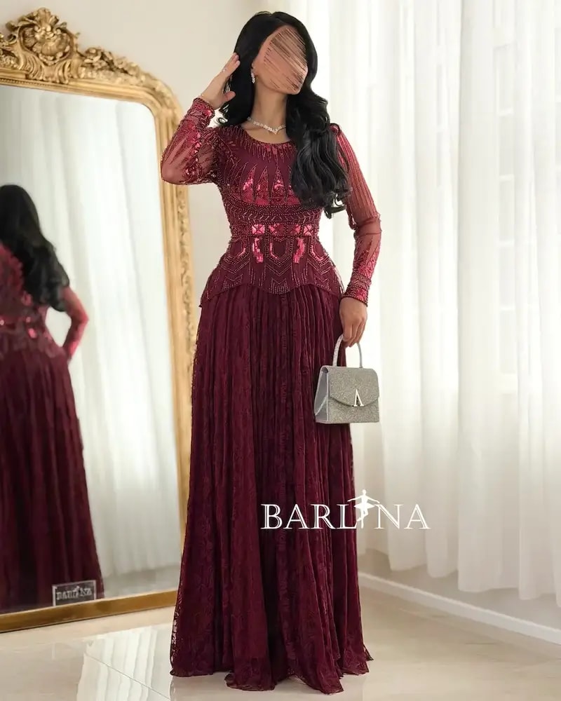 Lace evening dress with embroidered bodice