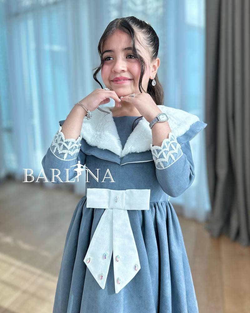 Girls' navy dress with white bow