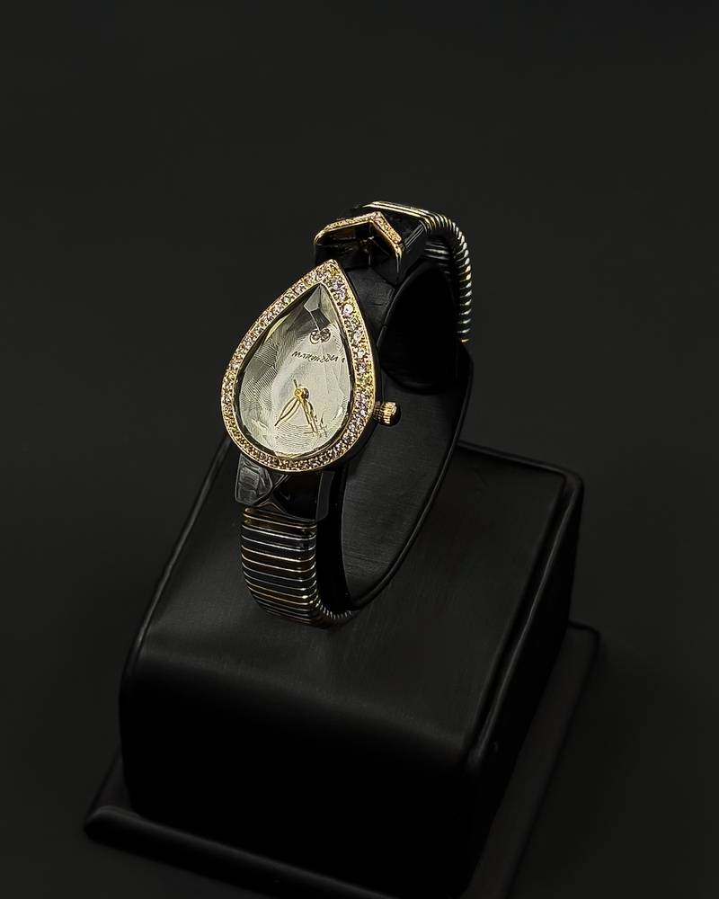 A luxurious women's watch in the shape of a teardrop