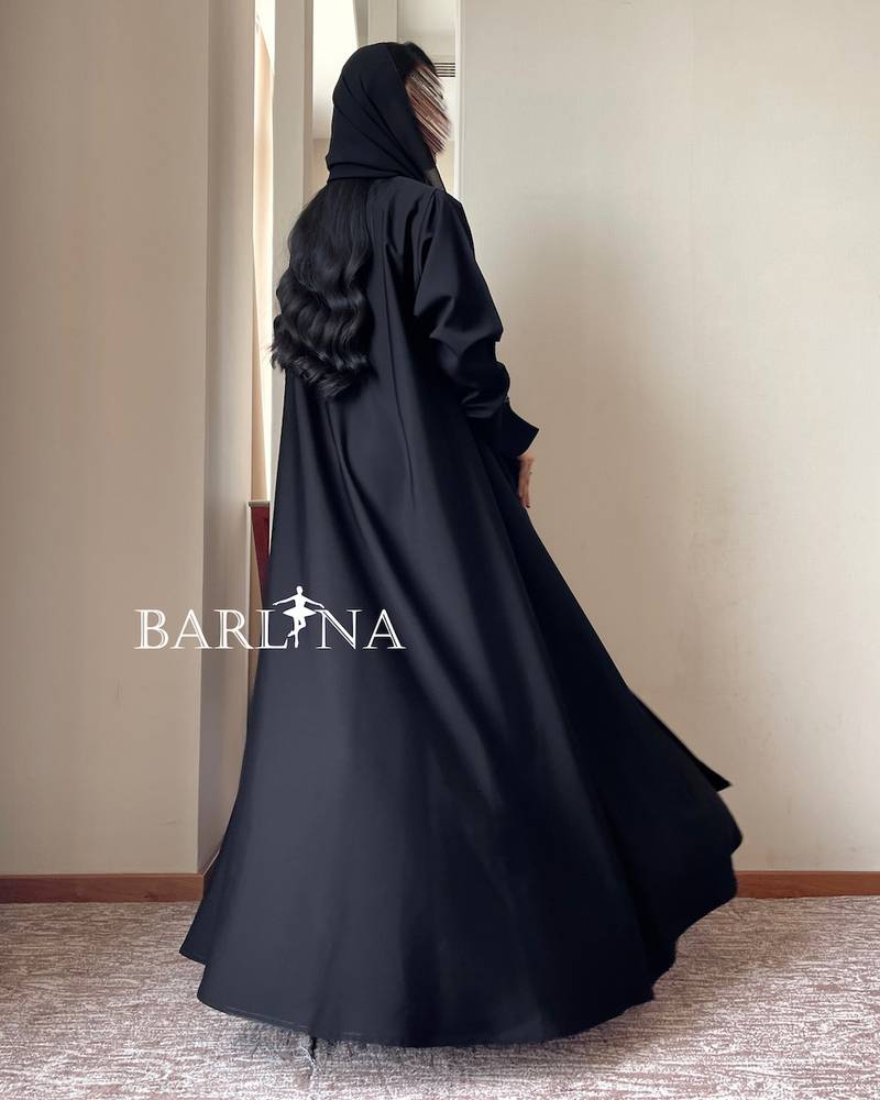 Black abaya with sleeves decorated with delicate details