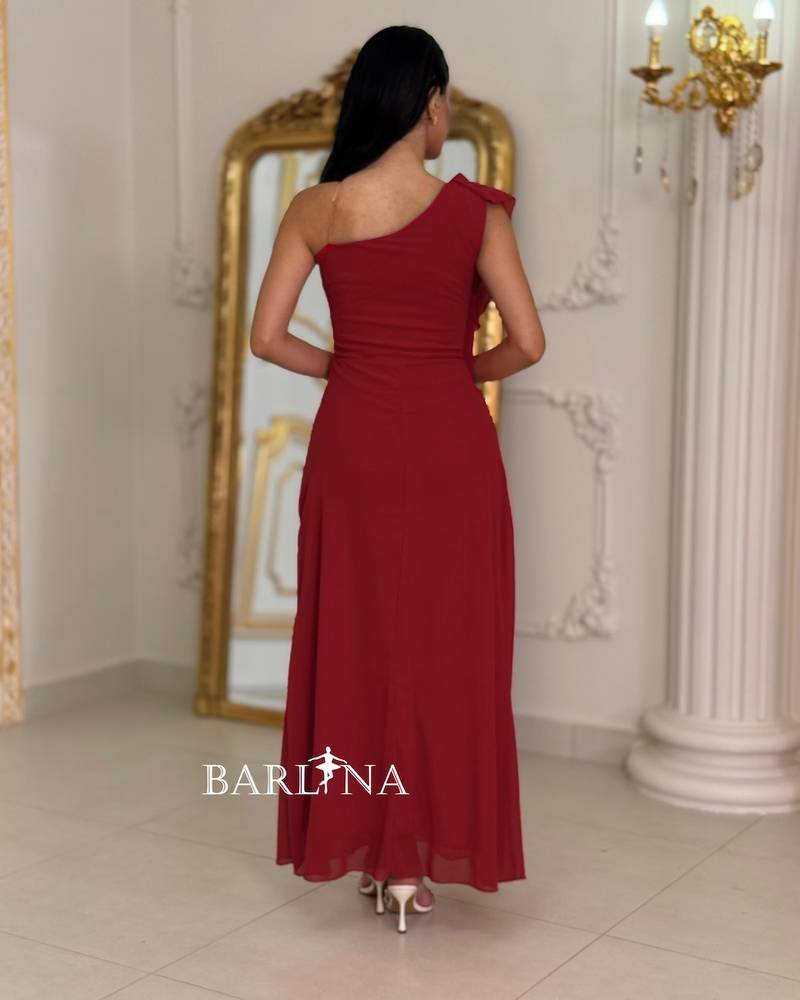 One-shoulder burgundy dress with a soft cut