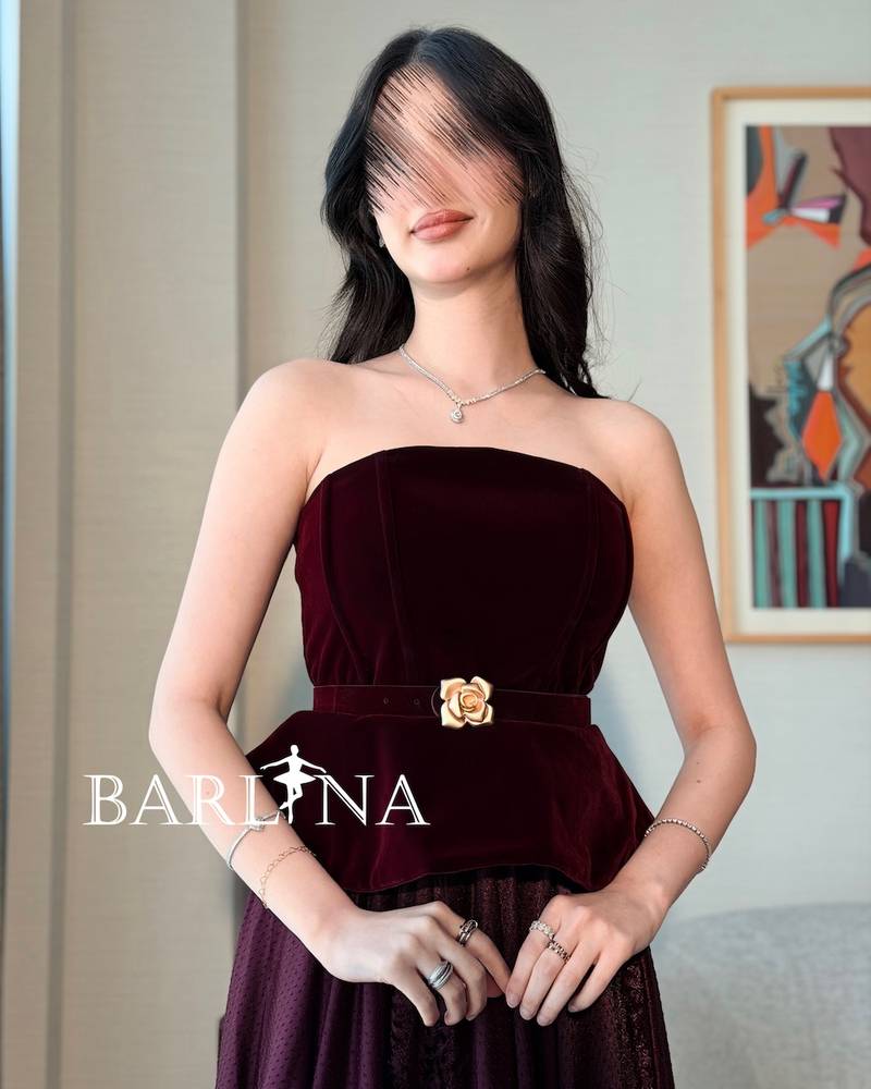 Burgundy peplum dress with a gold flower belt